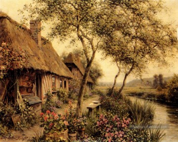Cottages à côté d’une rivière Louis Aston Knight Peinture à l'huile